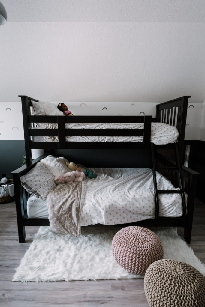 stencils behind a bunkbed