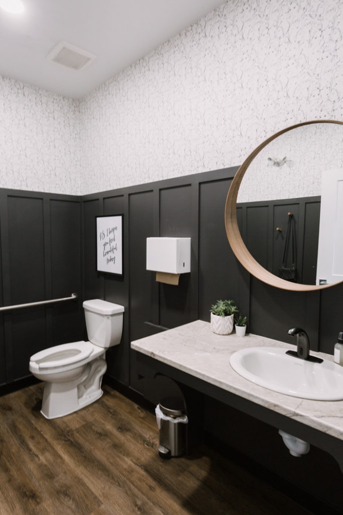 modern bathroom makeover with dark board and batten