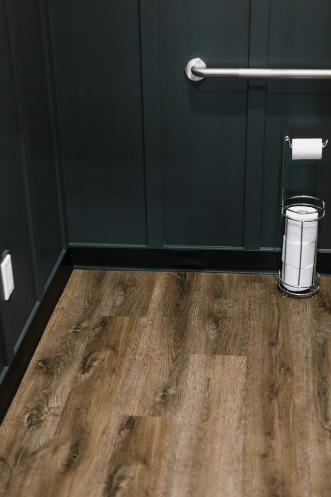 dark brown bathroom vinyl plank flooring