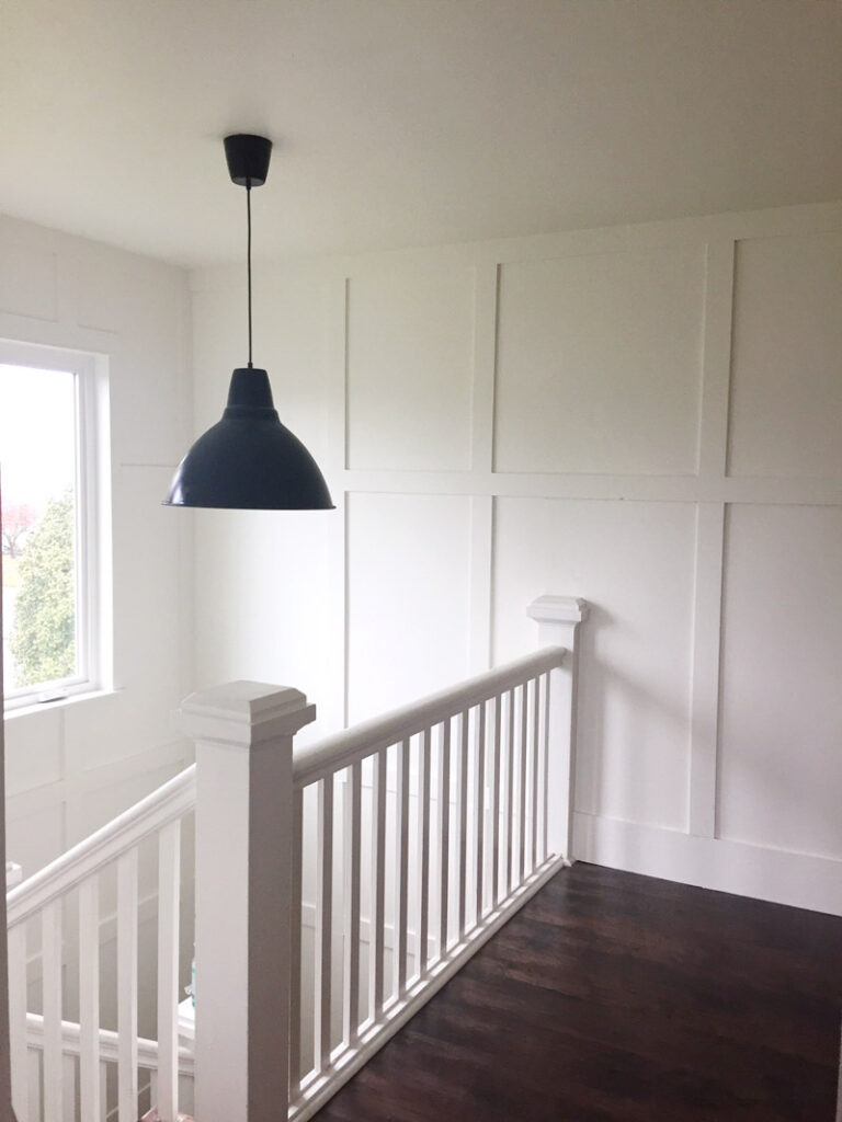 Beautiful hallway with thick board and batten walls