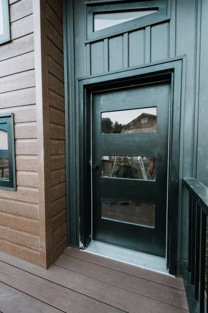 modern DIY kids door for a watertight playhouse