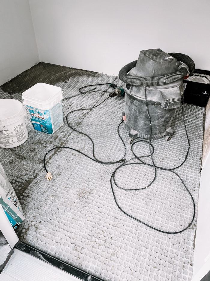 Adding membrane to the floor for tile