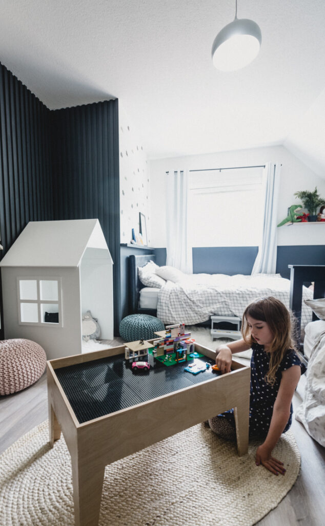 Girl at her LEGO table