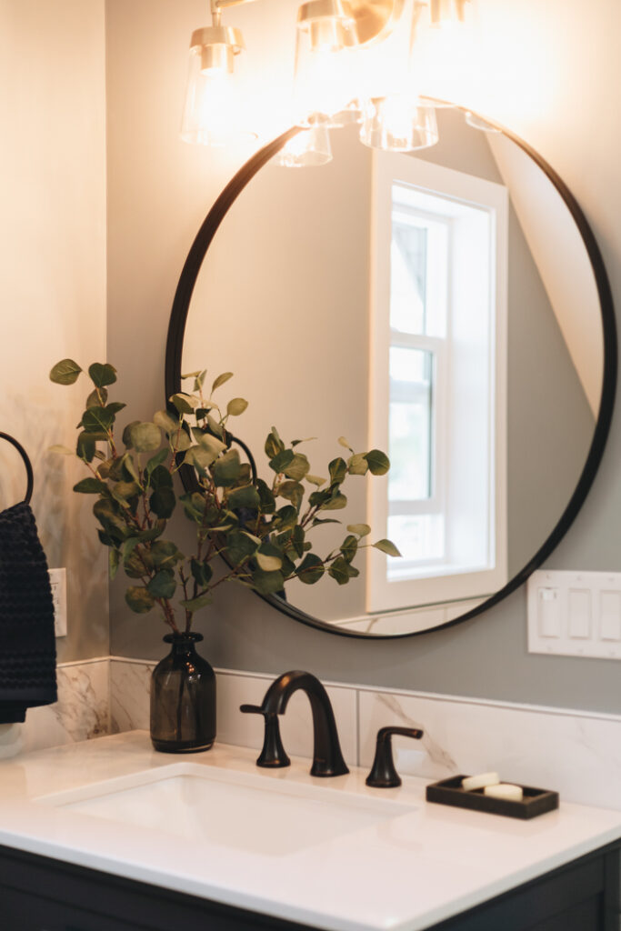 round mirror at farmhouse vanity