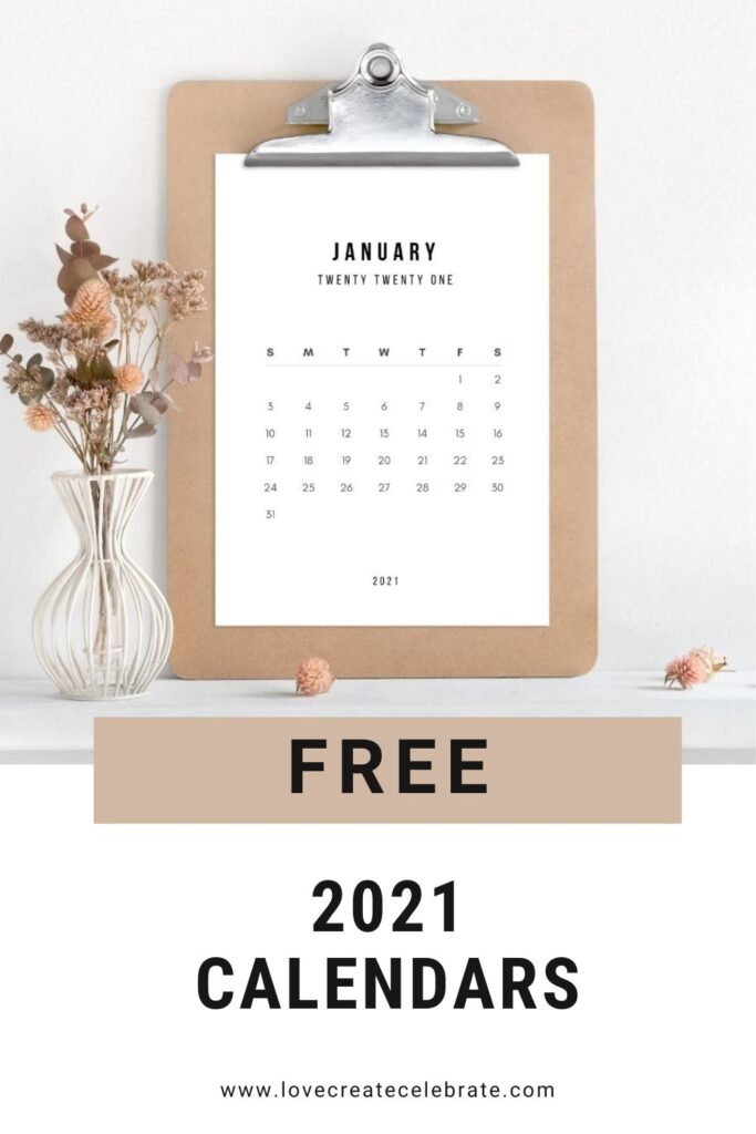 Modern Calendar on a clipboard with text reading "free 2021 calendar"