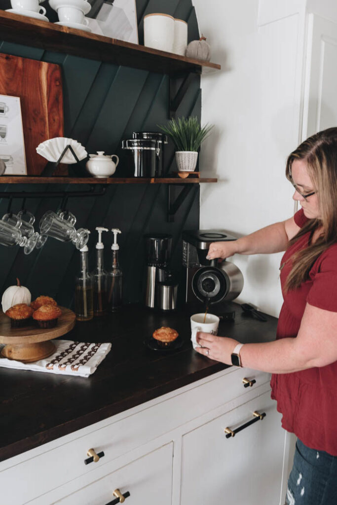 pouring coffee at simple fall coffee bar