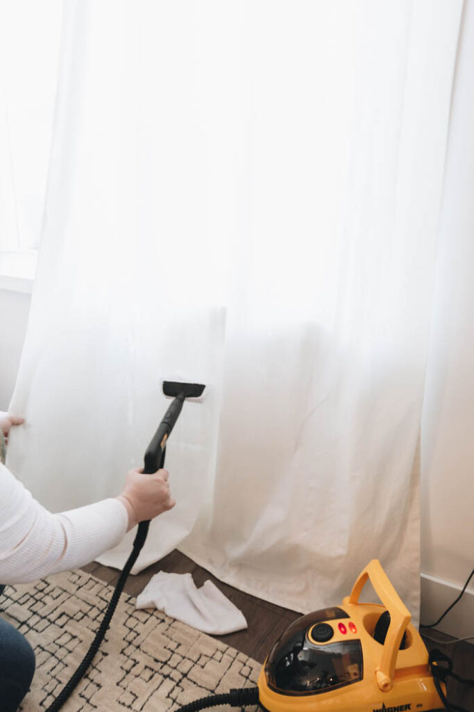 clean curtains with a steam cleaner
