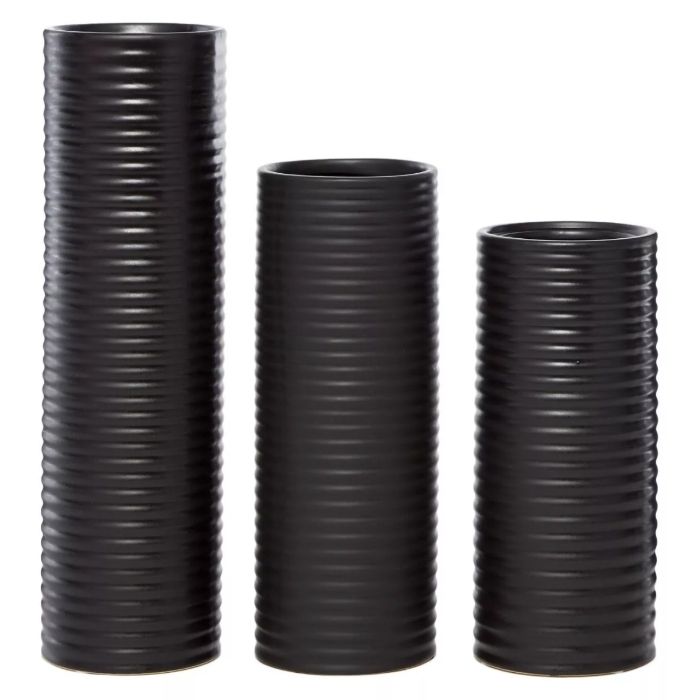 set of three black ribbed vases