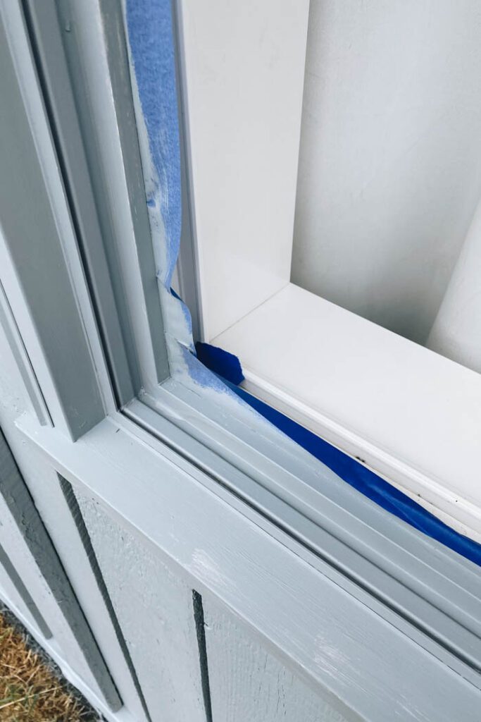 showing how to protect window tract when painting