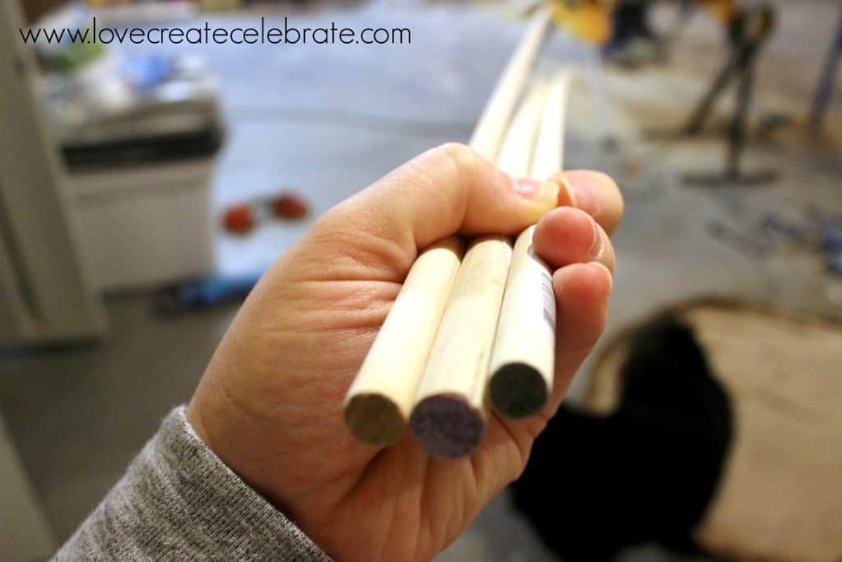 Image of wooden rods for a diy baby doll's crib