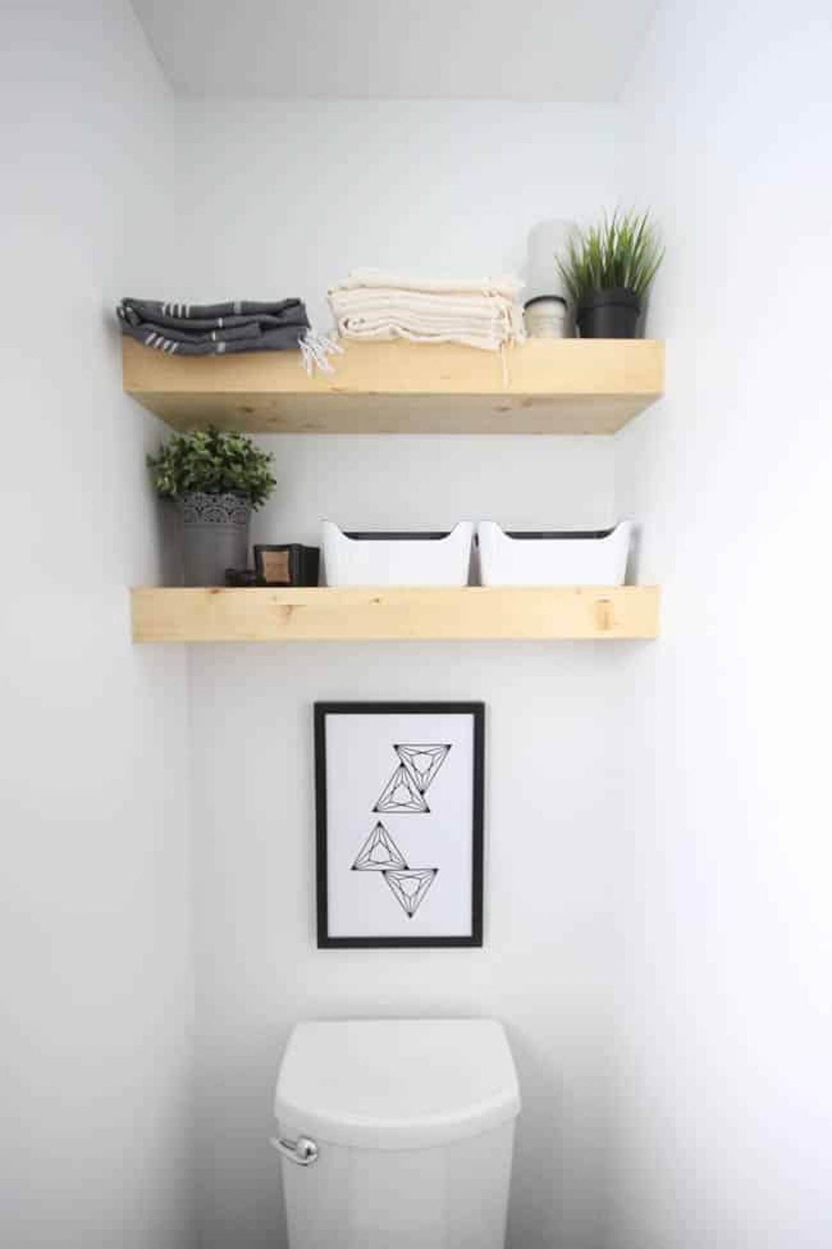 Completely decorated easy floating shelves in a bathroom