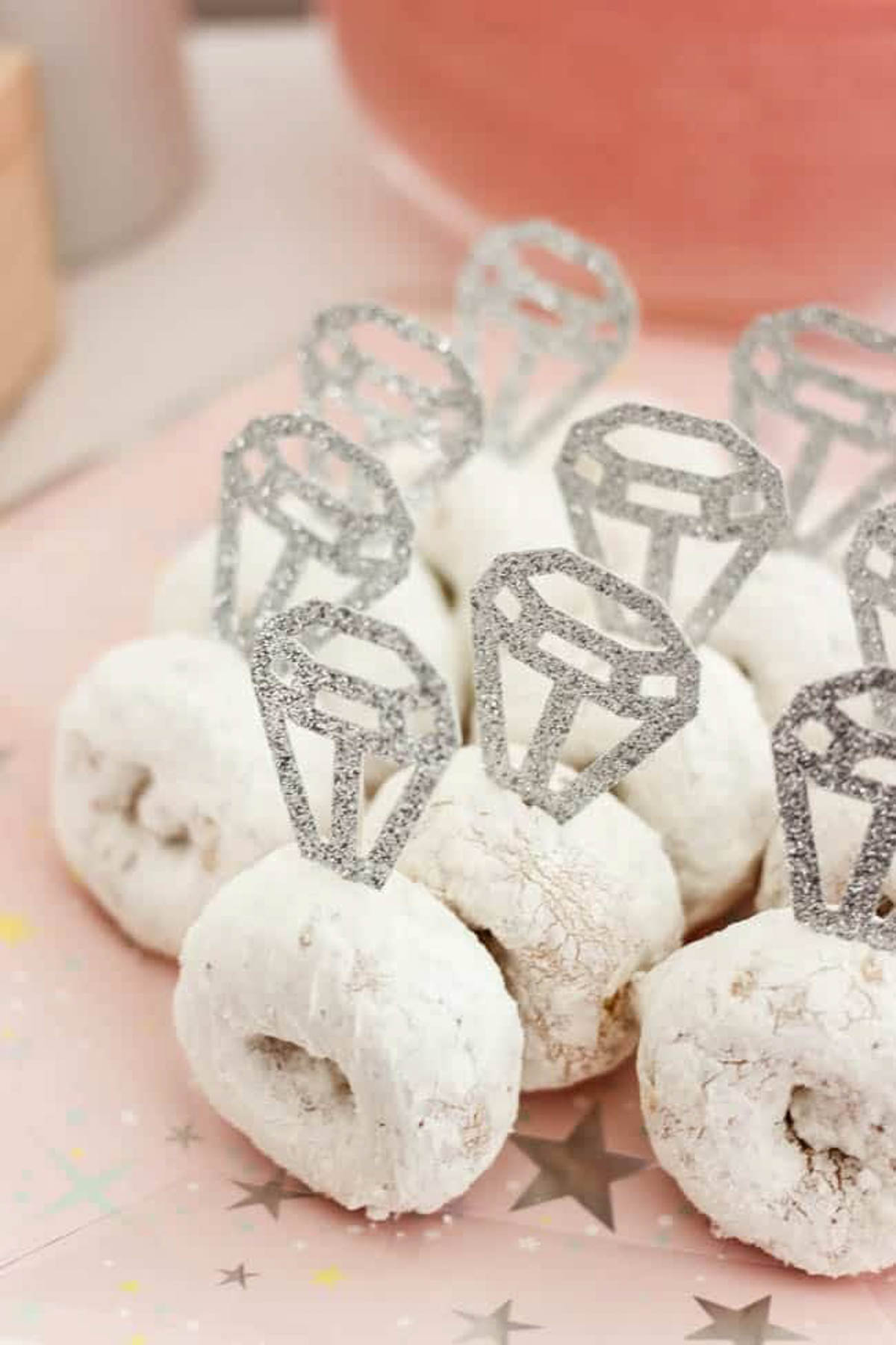 Doughnuts decorated with cardstock diamonds for a bridal shower
