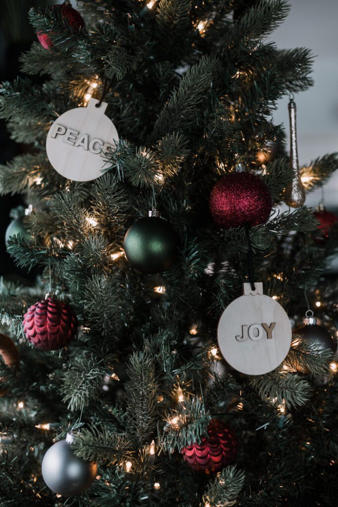 JOY and PEACE ornaments on the tree