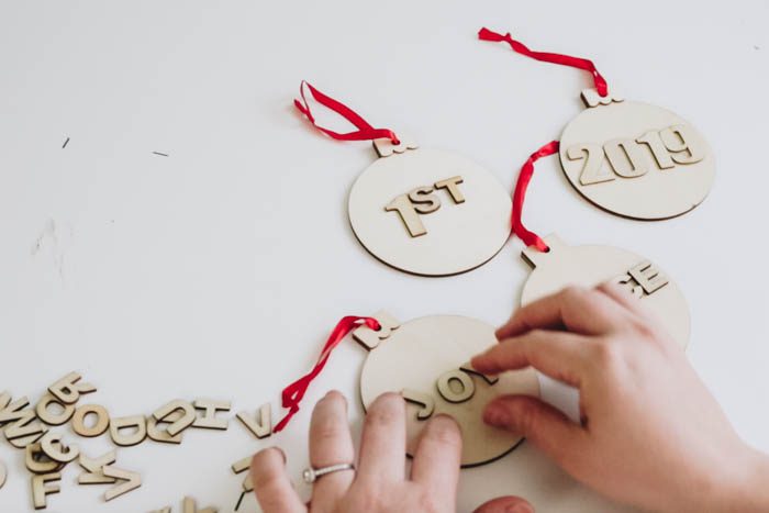 adding letters to wood Christmas ornaments