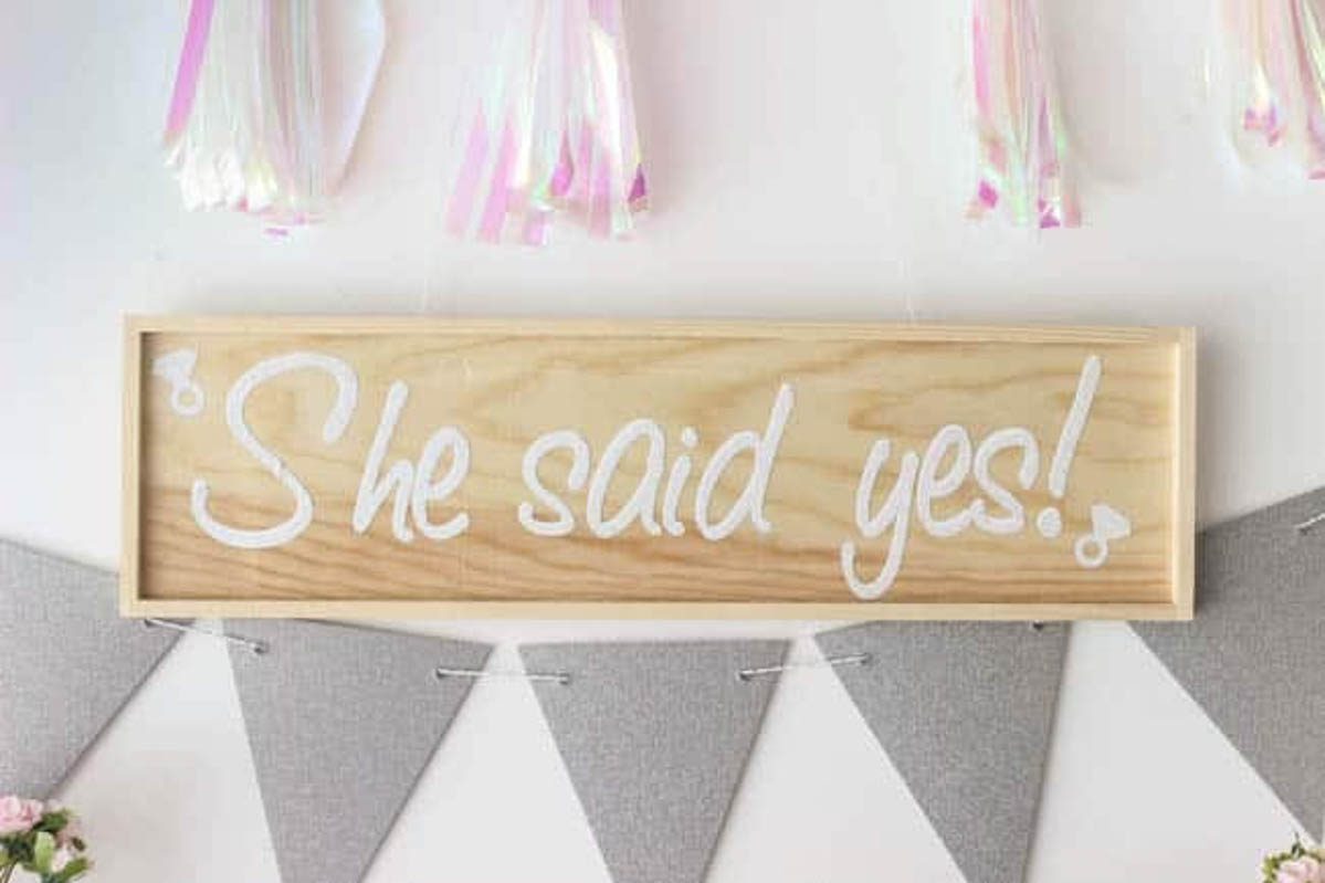 Wooden bridal shower she said yes sign