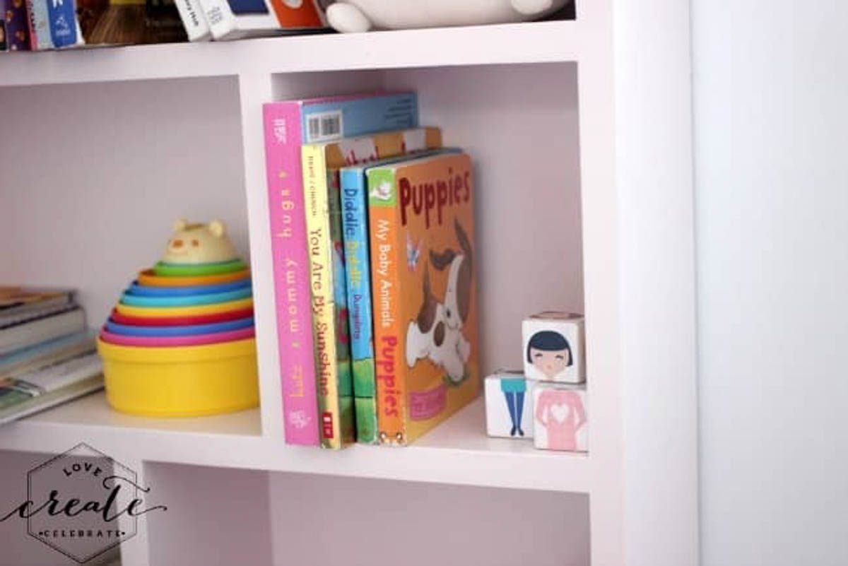 Staged house bookshelf painted pink