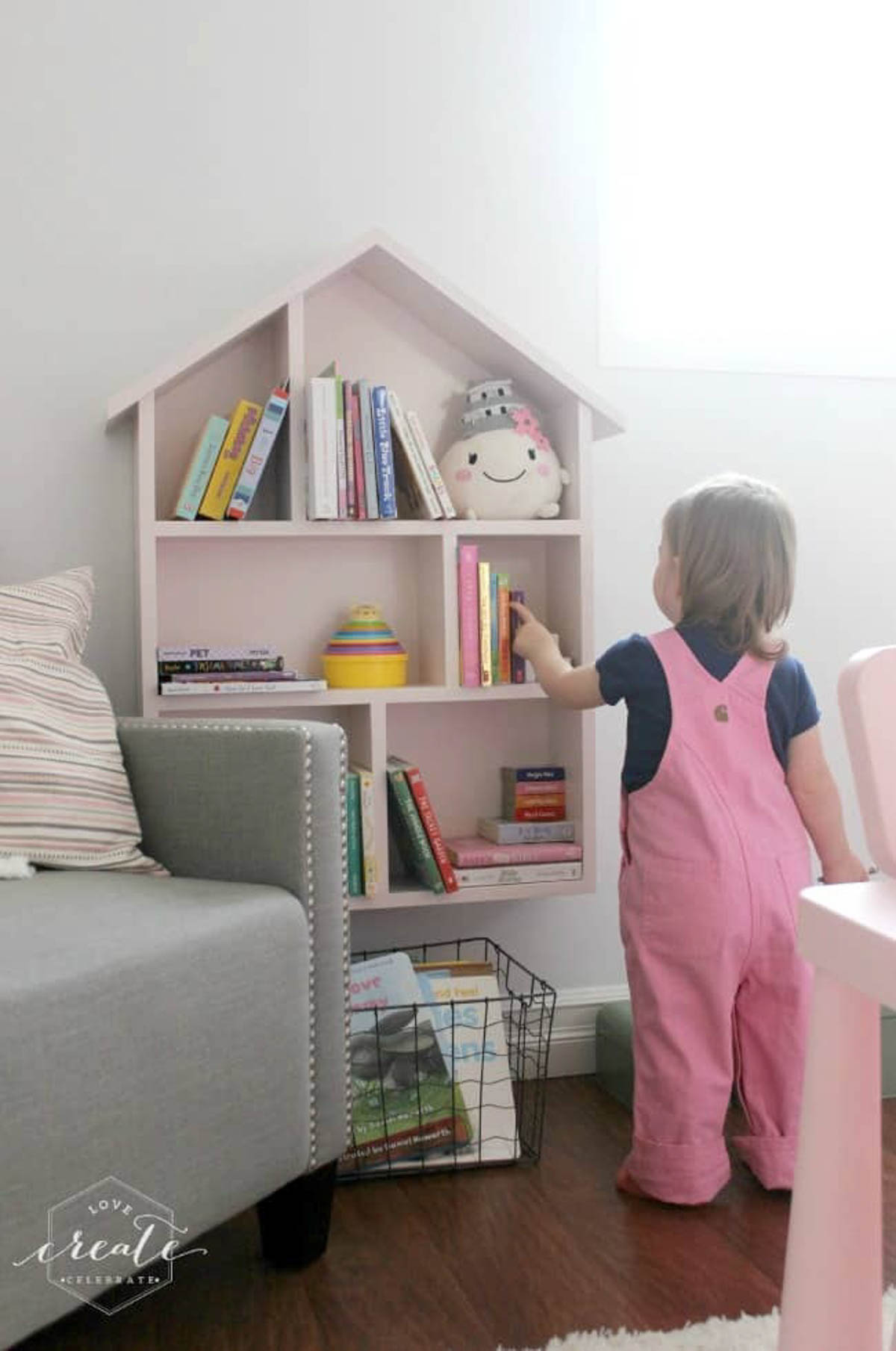 Completed house bookshelf painted pink