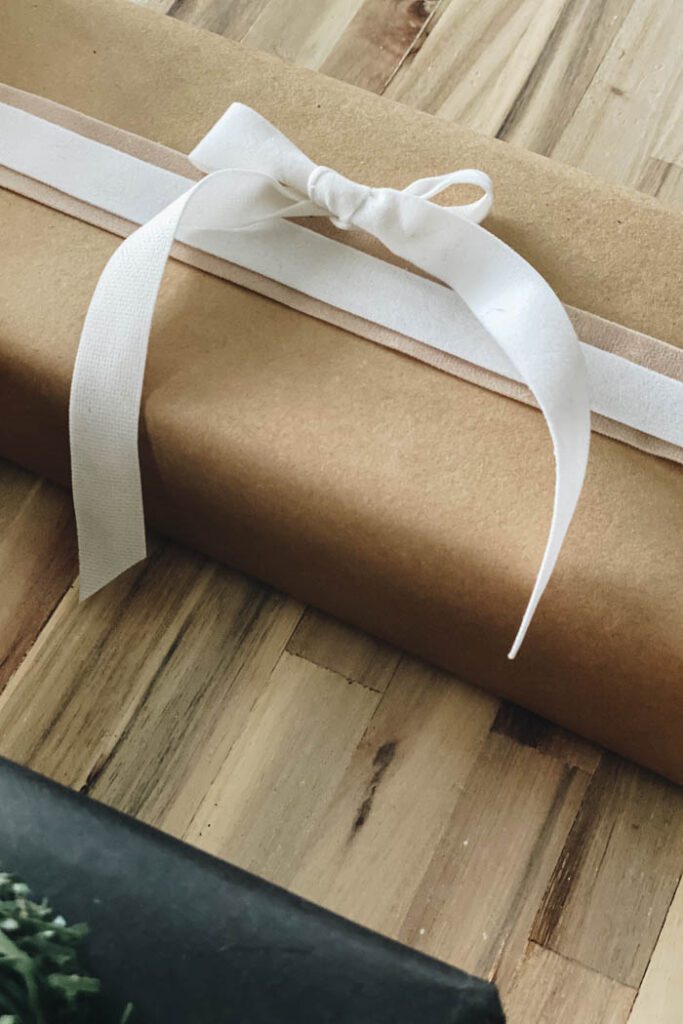 ribbon on package wrapped with brown kraft paper
