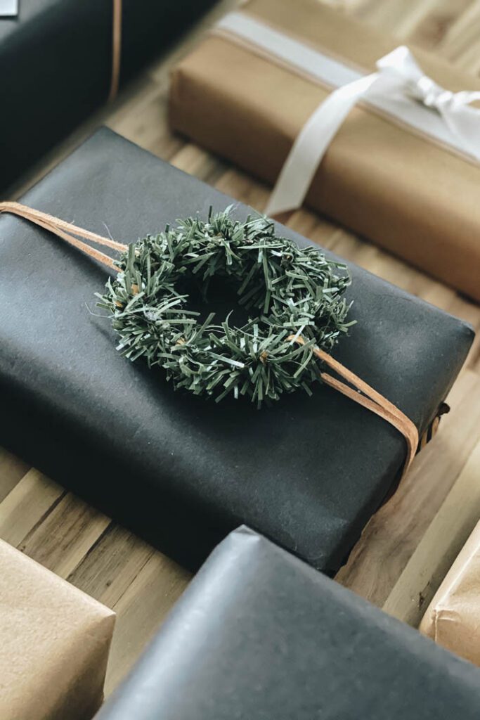 eco-friendly gift wrap with faux greenery