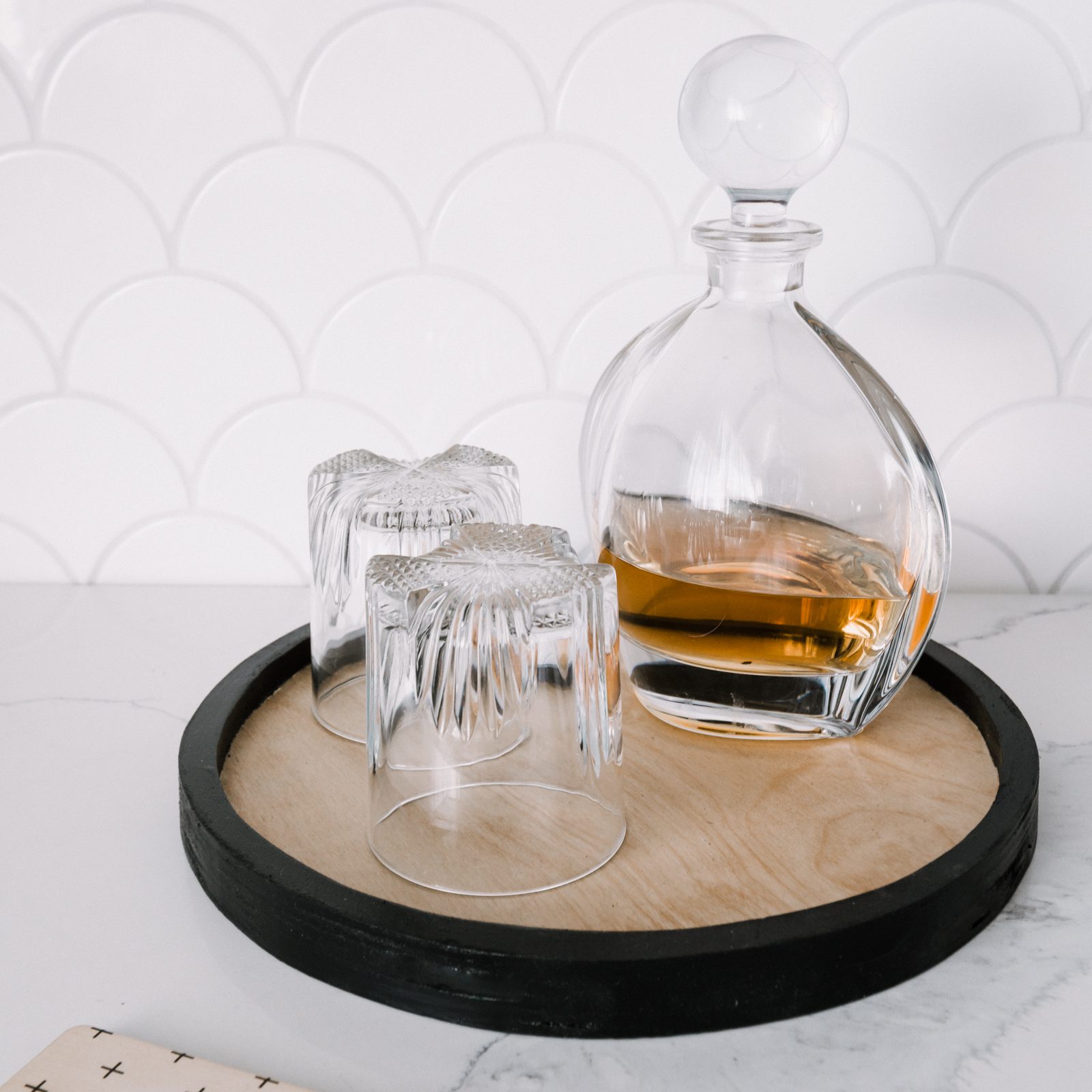 Modern wood tray with drink decanter and glasses