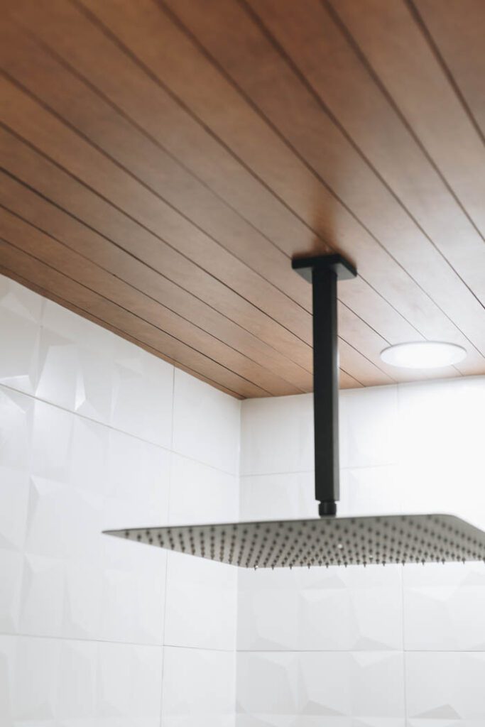 completed DIY wood celing with shower head