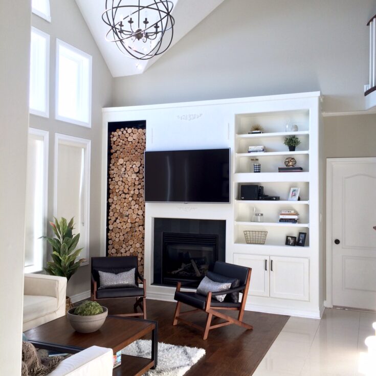 modern fireplace with wood wall
