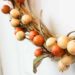 A cheap fall decor idea! Use an embroidery hoop to make a beautiful fall wreath! The perfect fall decoration idea. And you can make the entire piece in less than 20 minutes! Love the modern look of this fall DIY project :)