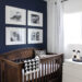 Beautiful ideas for a small nursery! This tiny baby room is off to the side of the master bedroom. Love the simple decor, from the navy wall to the brown crib and the beautiful gallery wall!