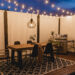 modern back patio with string lights