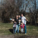 Family ready to build playhouse on empty space