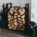 DIY fire wood rack next to fireplace with wood