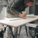 Man sanding wood